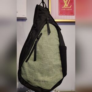 Sherpani Green and Black Sling Bag. NWT